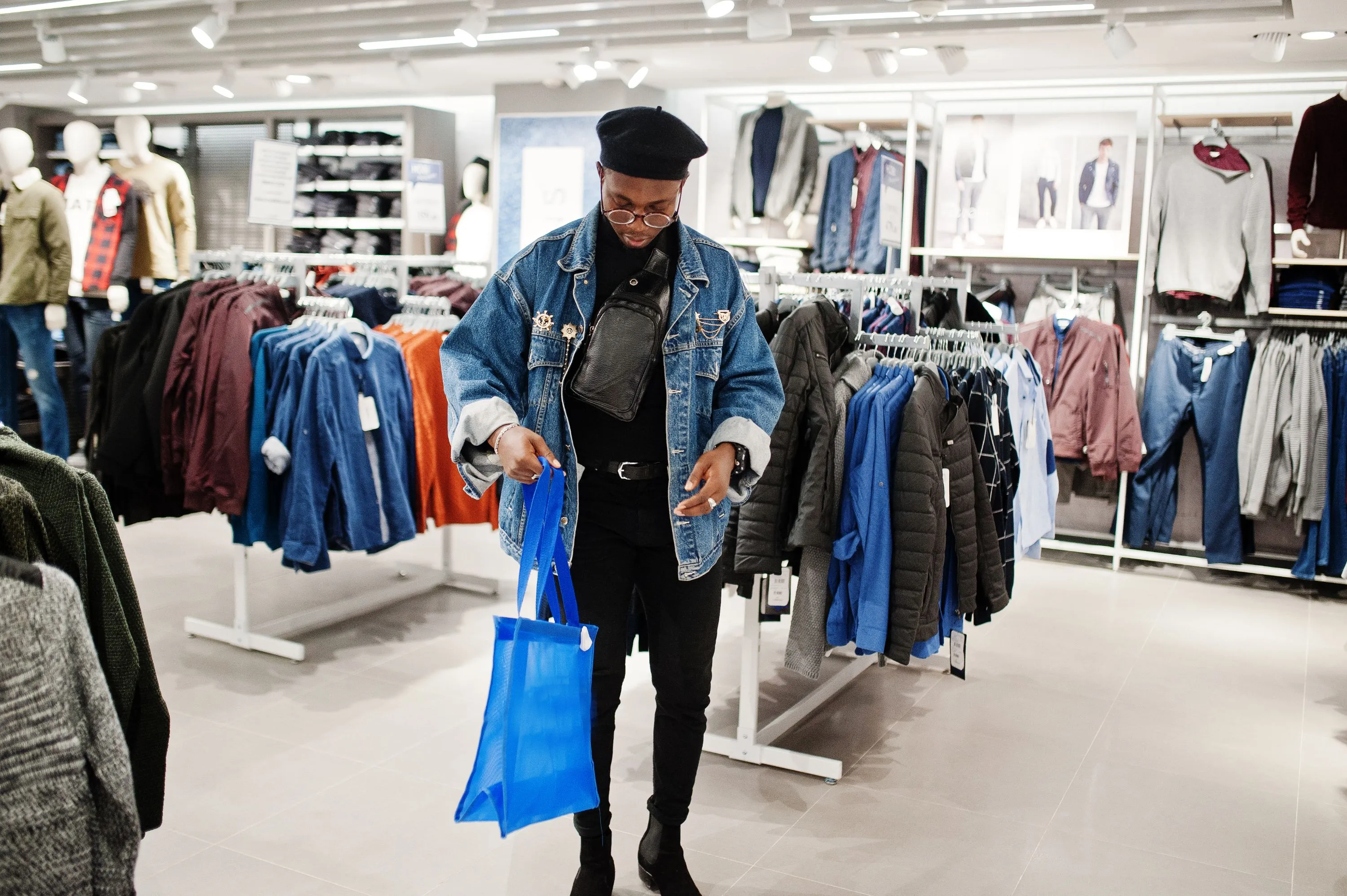 man in a clothes retail shop